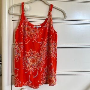 The CAbi summery top is a breezy addition to your dress up or dress down attire!